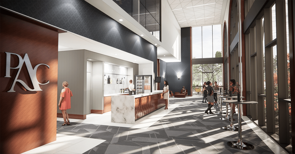 Rendering of the main lobby of the new performing arts center showing a long informational desk and large windows and tall ceilings